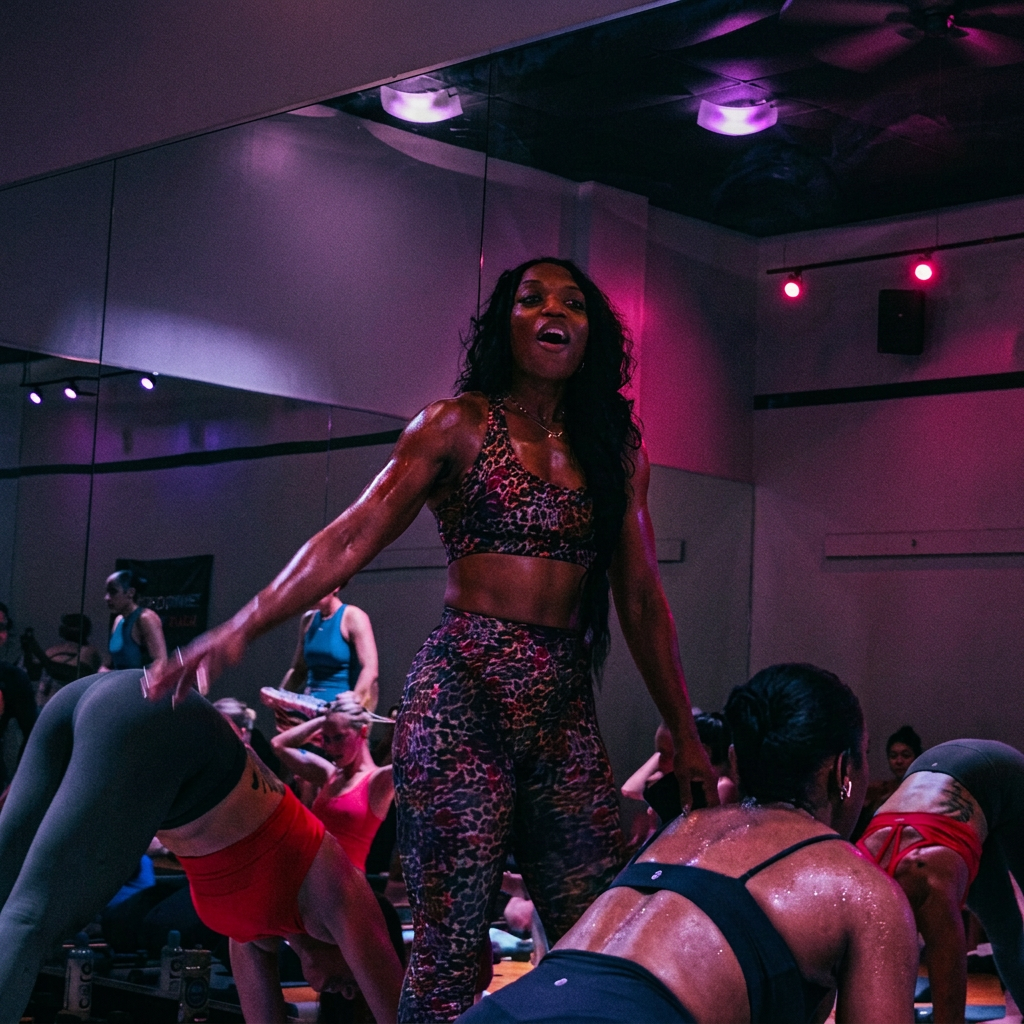 Danika leading a high-energy Yoga Sculpt class